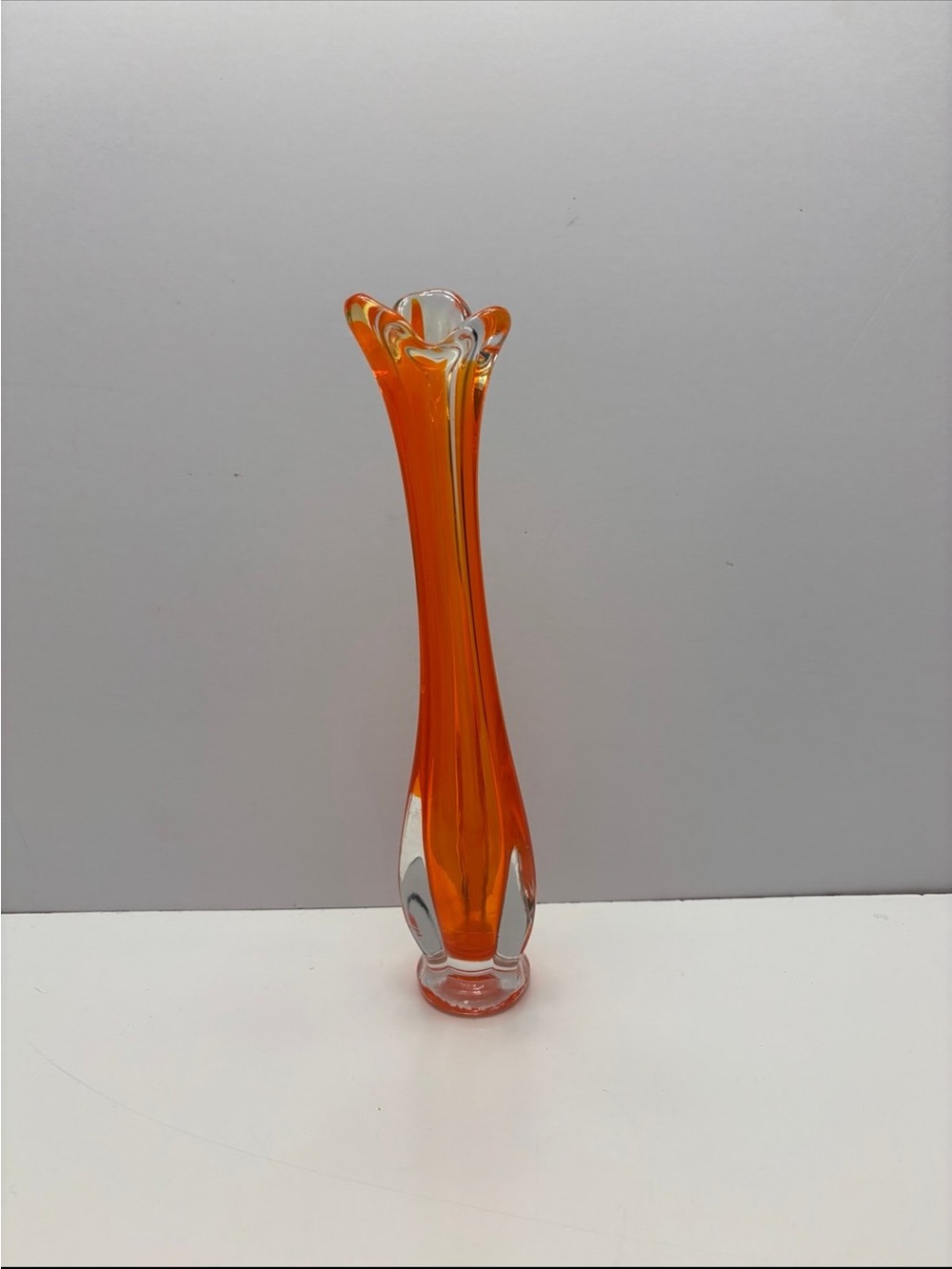 Vintage orange and clear glass swung bud vase
